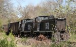 LRS 9573 & 9528 bring a load of empty coal hoppers into town